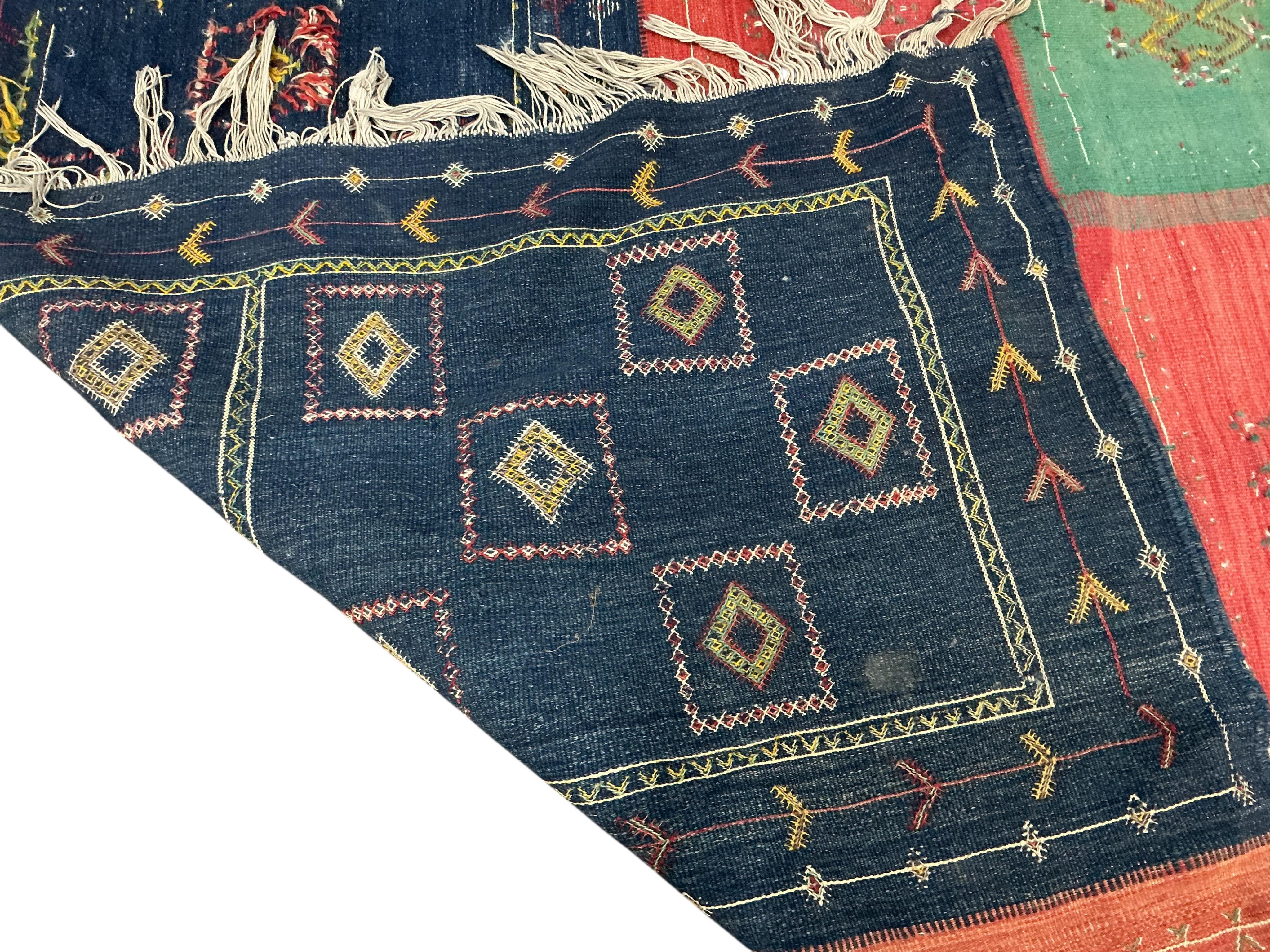 A Kilim polychrome flatweave carpet, 240 x 140cm